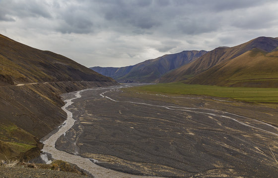 Riverbed in the mountains in the spring