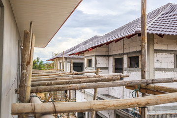 construction residential new house in progress at building site