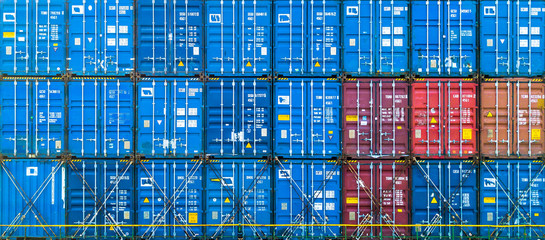 Stack of freight container in rows, Container in import export business and logistic and transportation. - obrazy, fototapety, plakaty