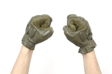 military tactical gloves hand in fist isolated on white