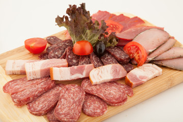 Party plate of salami, meat delicatessen