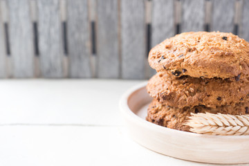 Oatmeal cereal cookies on wooden pallets stands wooden table