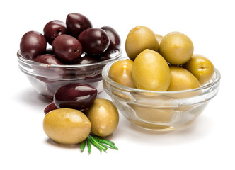green and black olives isolated in glass bowl on white background