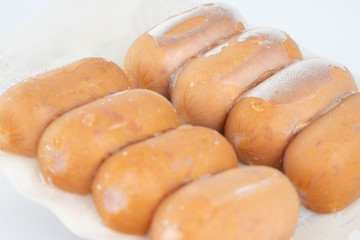 Sausages in plastic pack.