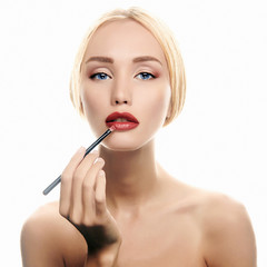 Make-up. blonde woman with red lipstick