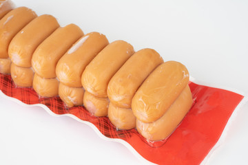 Sausages in plastic pack.