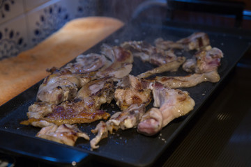 Grilled lamb chops on the grill in the kitchen. 