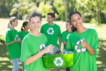 Happy environmental activists in the park 