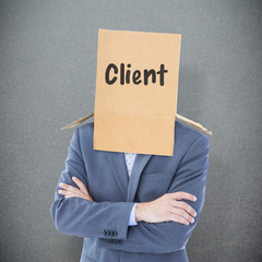 Anonymous businessman against grey background