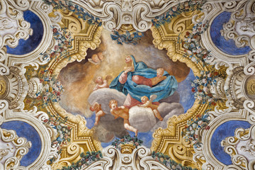 PARMA, ITALY - APRIL 16, 2018: The ceiling freso of The Asumption of Virgin Mary in church Chiesa di Santa Croce by Giovanni Maria Conti della Camera (1614 - 1670).