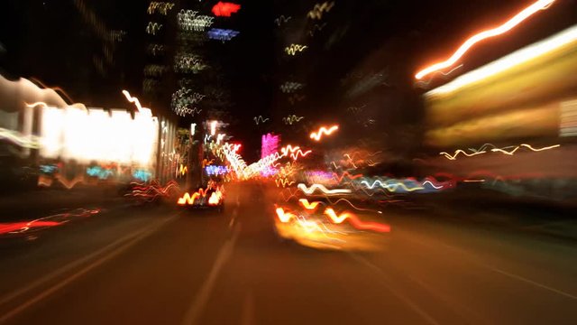 High-speed driver's POV of Times Square at night