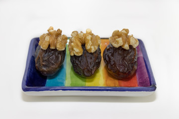 dates with nuts isolated on white background