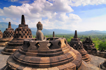 Stupas and Statue of Buddha at Borobudur Temple, Yogjakarta Indonesia.