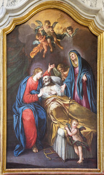 TURIN, ITALY - MARCH 14, 2017: The painting Death of St. Jospeh in church Chiesa di San Francesco by unknown artist of 18. cent.