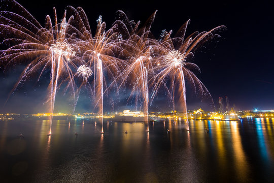 Malta International Fireworks Festival 2017, colourful fireworks over the Grand Harbour, in front of Fort St Angelo, Valletta, Malta, April 2017