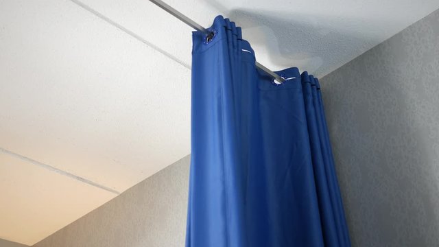 A Hospital Curtain Opens In An Operating Room