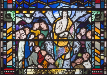 LONDON, GREAT BRITAIN - SEPTEMBER 16, 2017: The scene of Ascension of the Lord on the stained glass in church St Etheldreda by Charles Blakeman (1953 - 1953).