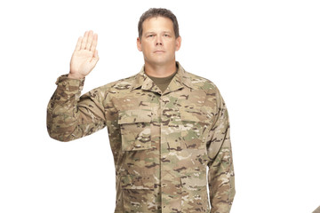 U.S. Army Soldier, Sergeant. Isolated with arm raised.