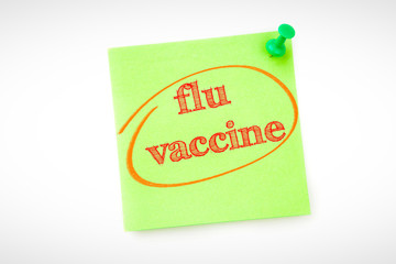 flu vaccine against green adhesive note