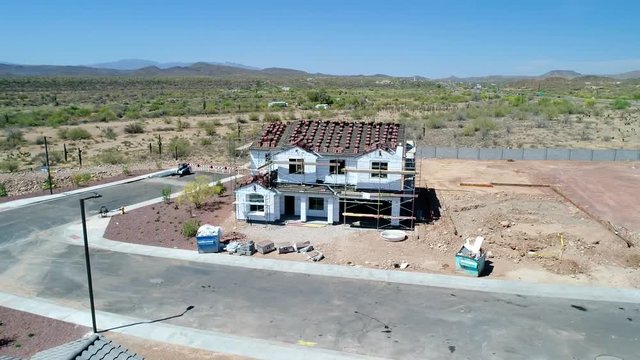 Aerial Arizona New Home Construction Site Fly Up To House