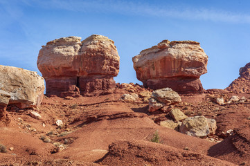 Twin Rocks,Capitol Reef National Park. Located in south-central Utah in the heart of red rock country,  this is a hidden treasure filled with cliffs, canyons, domes and bridges in the Waterpocket Fold