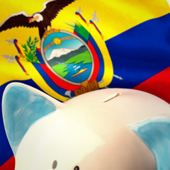 Piggy bank against digitally generated ecuador national flag