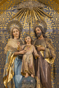 ZARAGOZA, SPAIN - MARCH 3, 2018: The carved polychrome sculpture of Holy Family in church Iglesia de San Miguel de los Navarros form 19, cent.