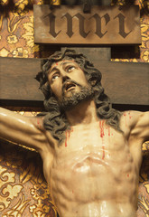 ZARAGOZA, SPAIN - MARCH 1, 2018: The detail of carved statue of crucificted Jesus Chris in church...