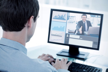 Happy businessman offering his hand  against back view of a businessman working with a computer