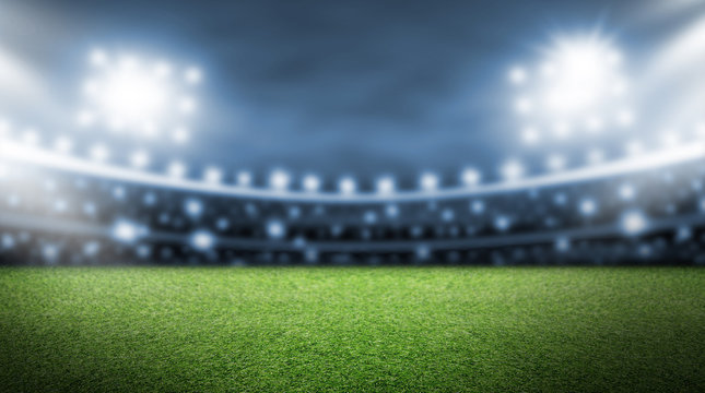 Fototapeta Soccer field and spotlight background in the stadium