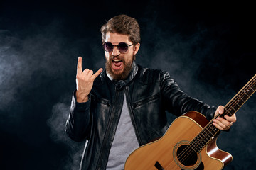 young man playing guitar