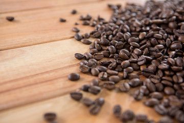 Roasted coffee beans spilled