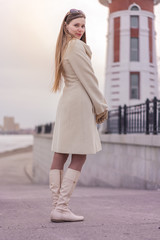 Fototapeta premium Portrait of a young pretty woman on sping evening