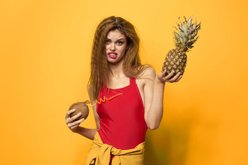 young woman with pineapple