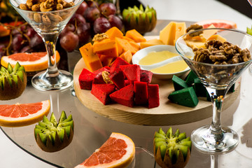 Assortment of cheeses, fruits, and snacks for the holiday