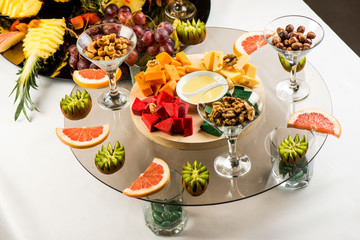 Assortment of cheeses, fruits, and snacks for the holiday