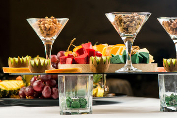 Assortment of cheeses, fruits, and snacks for the holiday