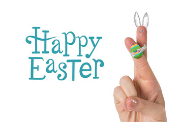 Fingers as easter bunny against happy easter