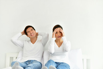 Fototapeta premium A couple lover is upset about something in the bedroom.