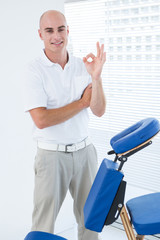 Doctor in front of medical chair 