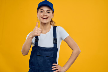 delivery woman smiling on yellow background