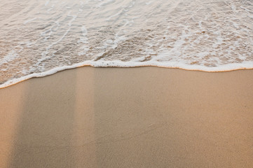 Fototapeta na wymiar Soft wave of ocean on beach