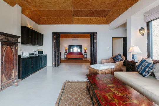 Tropical luxury villa interior, living room retro asian style