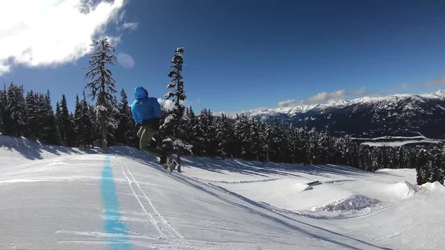Pro Snowboarder Big Jump Spin