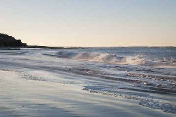 Sea waves on a beach ocean background in sunny day