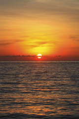 An image of a nice red sunset with a big yellow sun