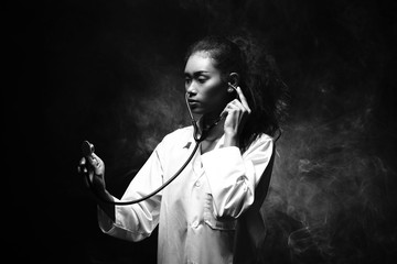 Doctor Nurse woman in uniform with stethoscope acting post check health