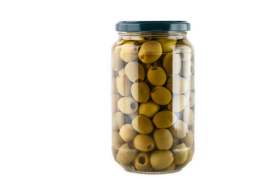 Green olives jar on a white background. copyspace