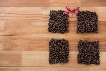 Roasted coffee beans forming shape