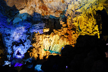 Colorful inside of Hang Sung Sot cave world heritage site in Halong Bay, Vietnam